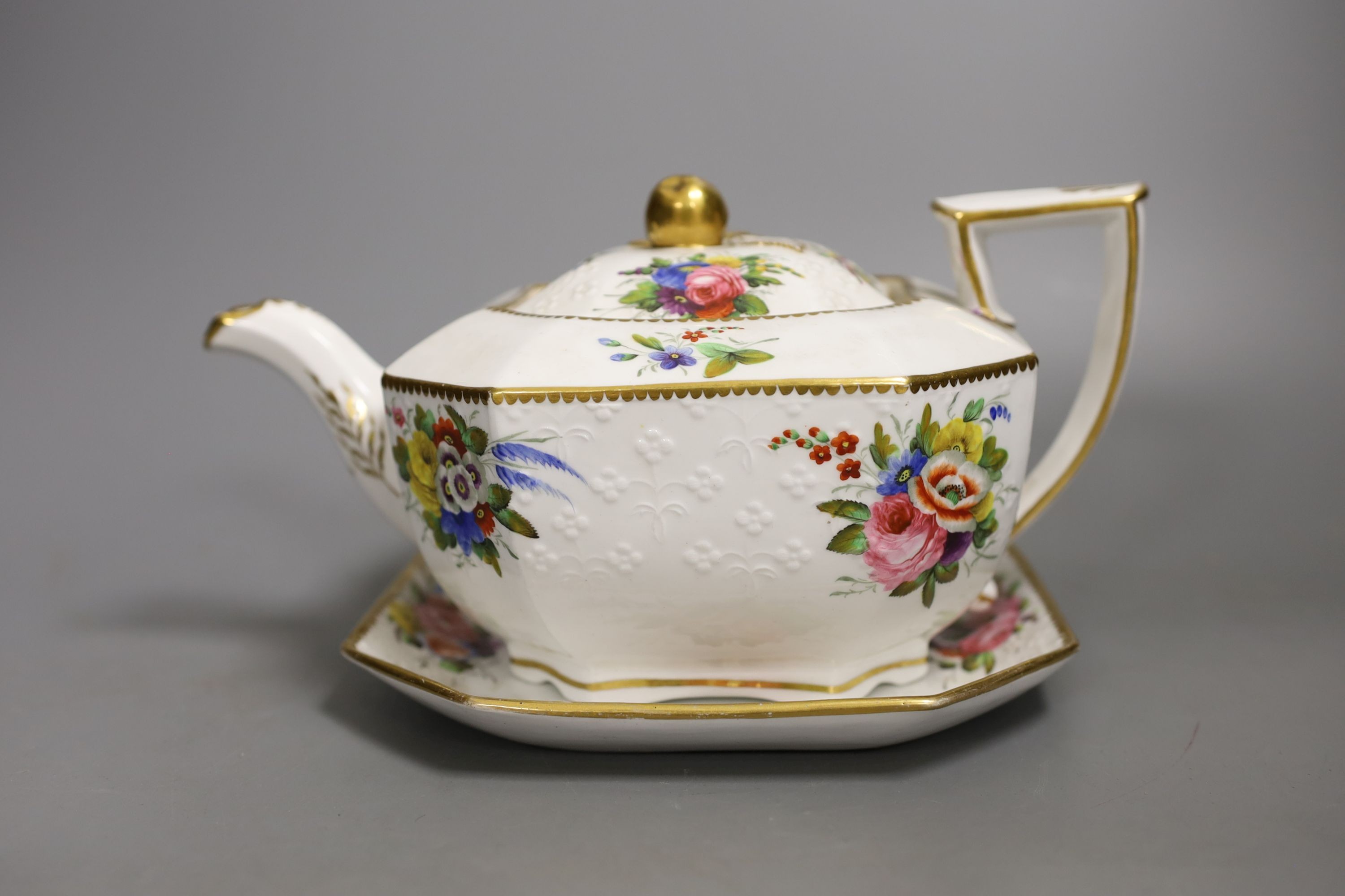 A Spode teapot cover and stand painted with flowers on a moulded body pattern 2527, c.1820, 24cm long